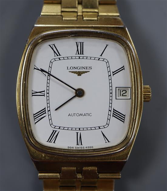 A gentlemans steel and gold plated Longines automatic wrist watch.